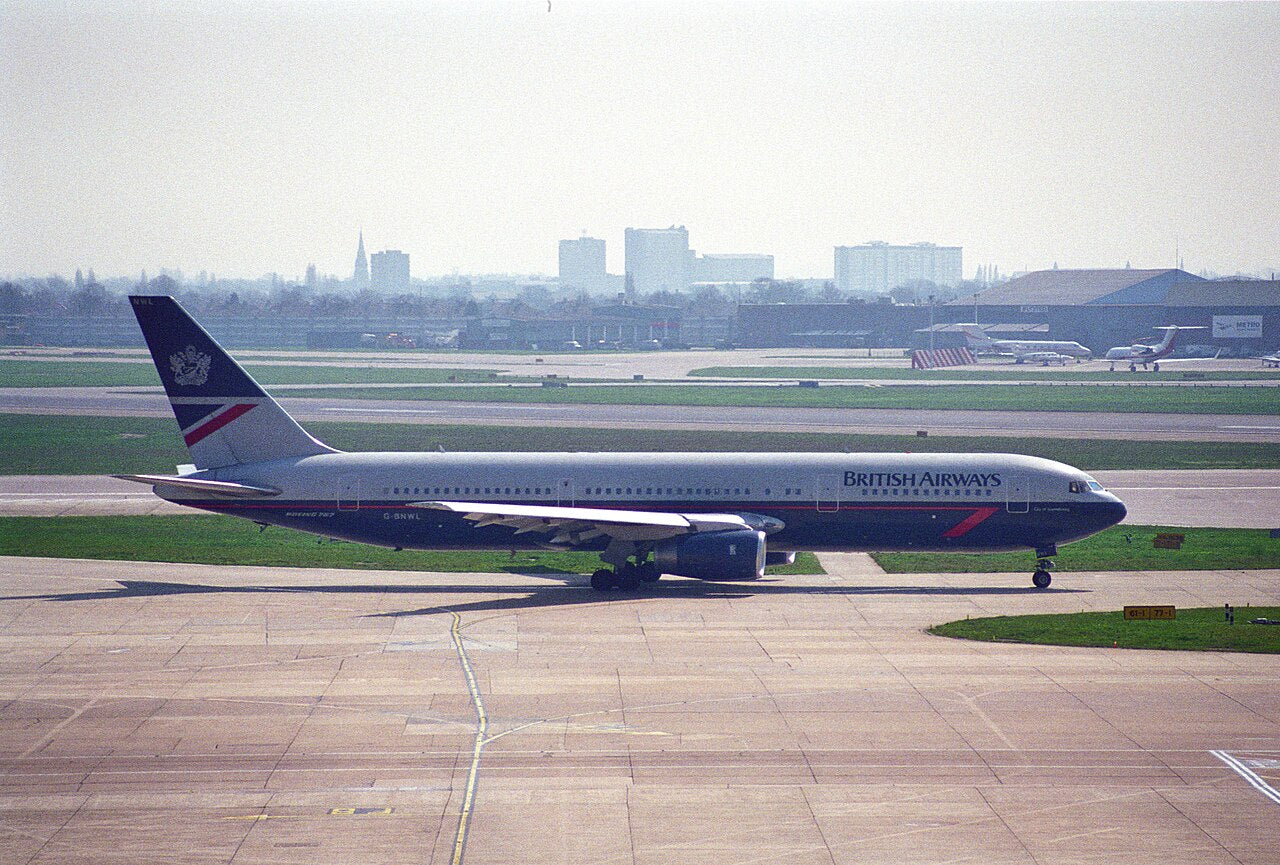 Side view of a British Airways Boeing 767 with its full nose, tail and wings inside the frame.