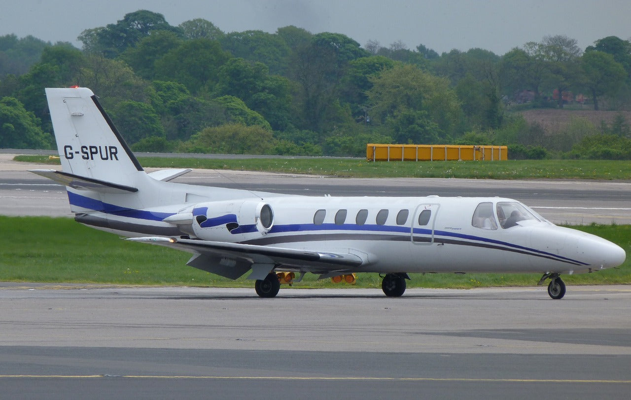 Citation II G-SPUR on the ground, with a low wing and jet engines at the rear.